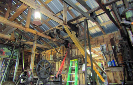 view of pulleys going up to the ceiling from the engine.